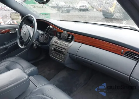 2003 Cadillac Deville Standard z USA, uszkodzony, nr VIN 1G6KD54Y63U184550